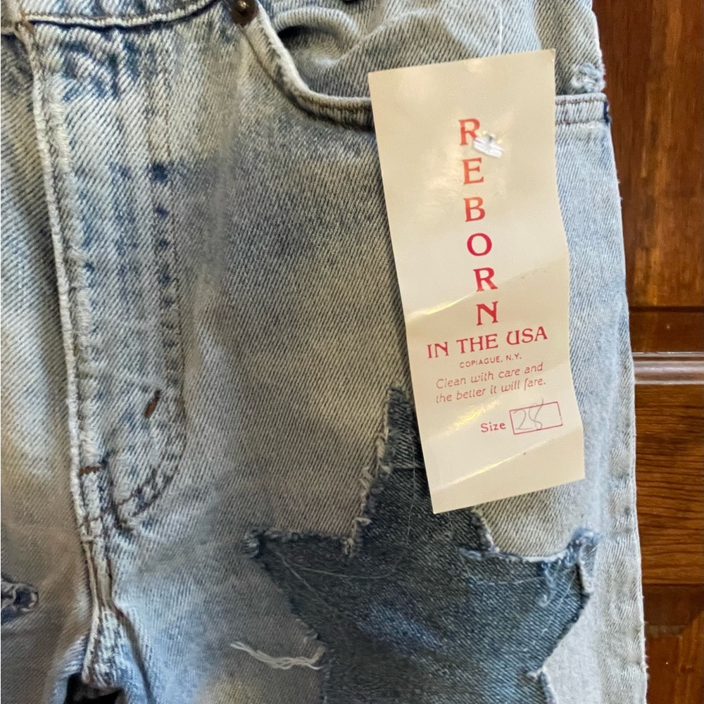 Levi's Blue Boyfriend Jeans with Distressed Star Design - Picture 2 of 5